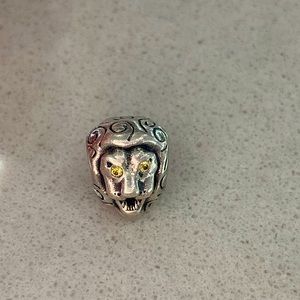 Retired Pandora lion charm with CZ eyes